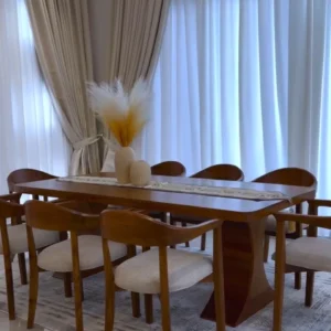 Auburn Mvule 10-seater dining set with light upholstered armchairs