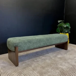 Olive green upholstered bench with long textured seat and exposed brown wooden frame