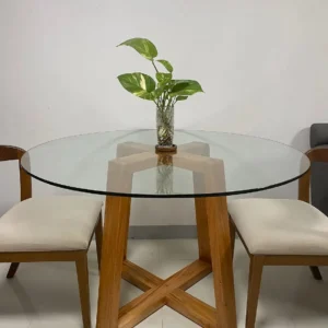 Sculptural 2 seater glass dining set with crossed base in Kenya