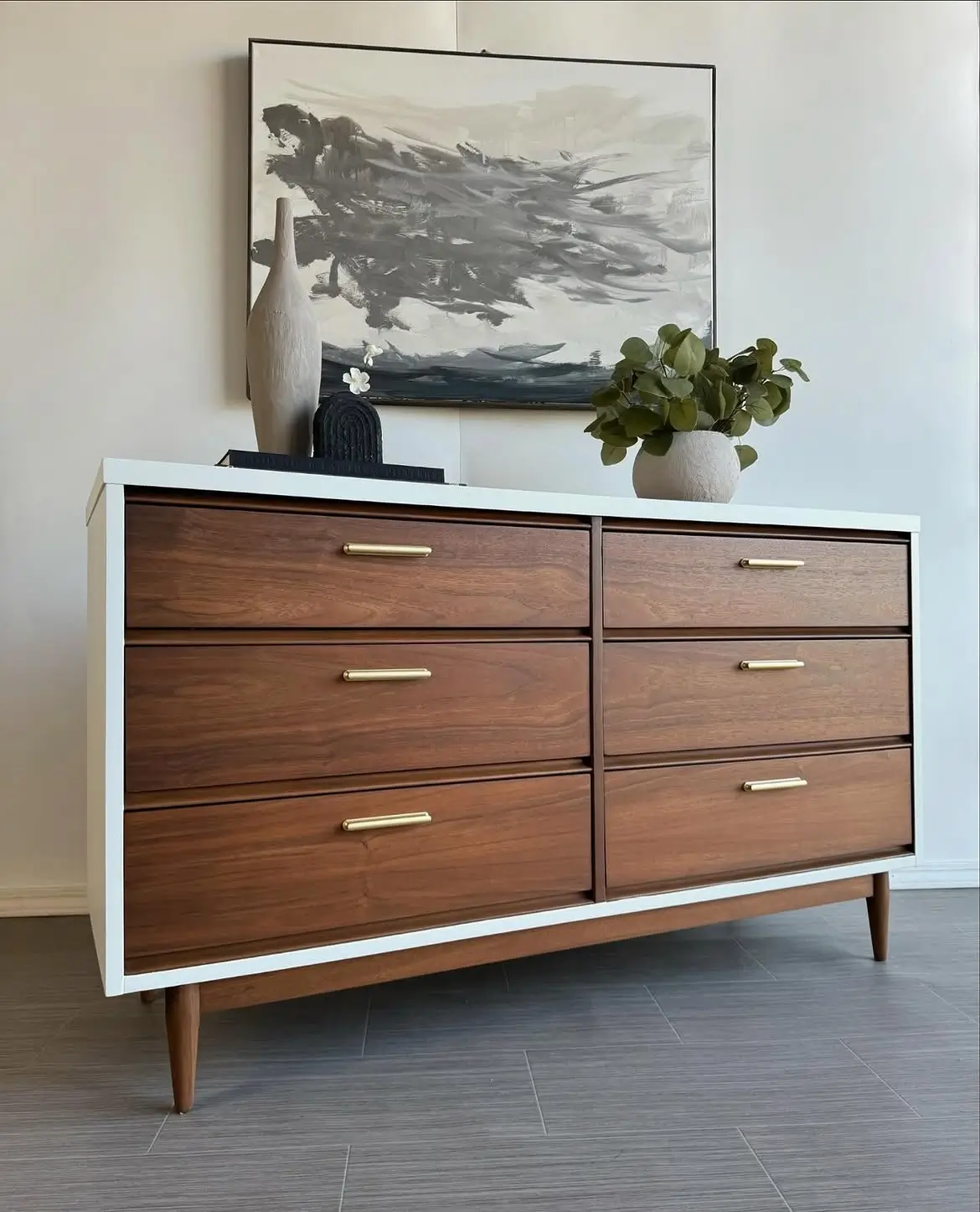 Six-drawer laminated office storage cabinet with wood-tone fronts