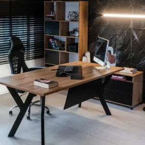 Walnut-finish executive office desk with black angular legs and modesty panel in a modern office