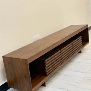 Warm-brown TV stand with ribbed centre fronts and open end shelves