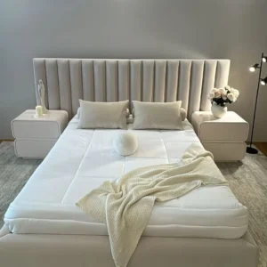 White 6x6 bed frame with wide vertical channel-padded headboard