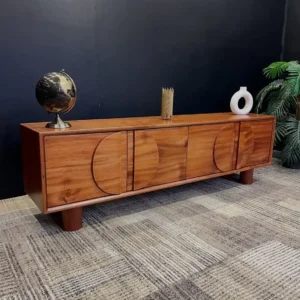 Warm brown wood-look storage console with circular geometric front detailing and short cylindrical legs.