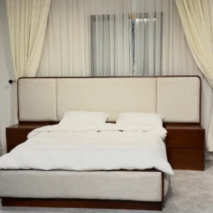 5×6 wooden bed with wide three-panel upholstered headboard