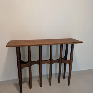 Calder console table with curved open-frame support design