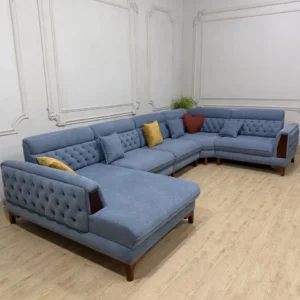 Blue Ashford U-shape sofa with tufted upholstery and chaise
