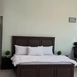 Monsoon Ashhaven 5×6 dark brown mahogany bed with three-panel headboard and matching footboard