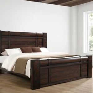 Monsoon Bayridge 6×6 dark rustic-brown wooden bed with rounded horizontal headboard rail, substantial square posts and matching raised footboard.