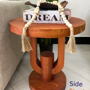 Reddish-brown round side table with U-shaped wooden-look supports and circular pedestal base
