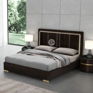 Monsoon Birchhill 6×6 dark brown wooden bed with wide rectangular headboard, gold-tone vertical lines, light border detailing and low footboard.