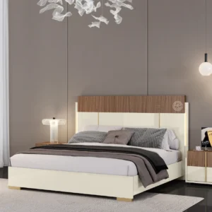 Monsoon Bluegate 6×6 wooden bed with brown wood-look upper headboard, cream lower panels, gold-tone accents and matching cream frame.