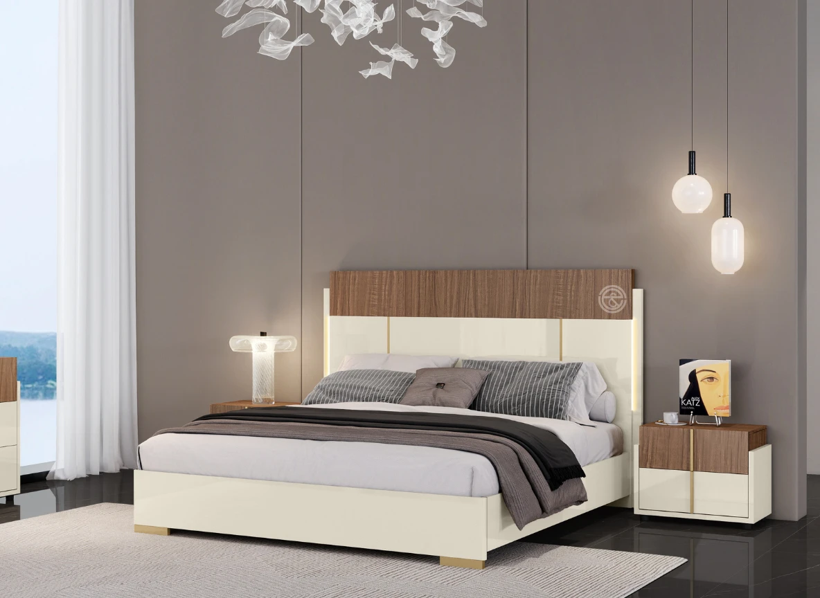 Monsoon Bluegate 6×6 wooden bed with brown wood-look upper headboard, cream lower panels, gold-tone accents and matching cream frame.