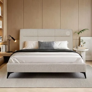 Monsoon Briarridge 6×6 beige fabric upholstered bed with stitched padded headboard, low matching frame and black tapered legs.