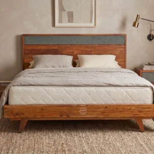 Monsoon Clearhill 6×6 natural brown wooden bed with three grey headboard inserts, horizontal wood panels and angled legs.