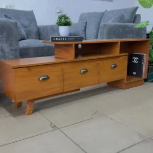 Monsoon Hartbourne 7-foot brown TV stand with stepped shelves, three cup-style handles, open storage compartments and angled legs.